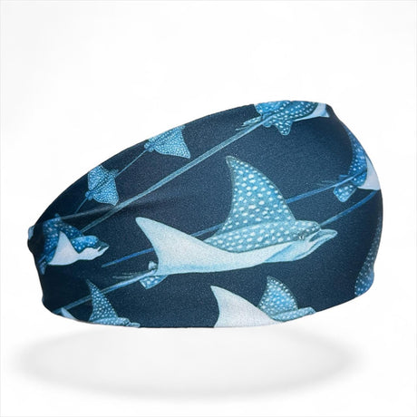 Navy headband with eagle ray pattern on a white background