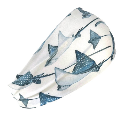 Headband with blue eagle ray pattern on a white background