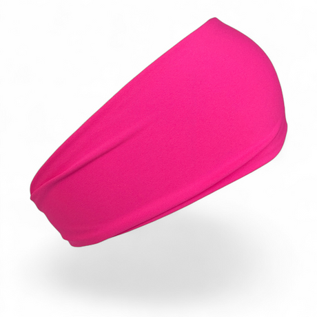 A bright pink athletic headband floating against a clean white background with a soft shadow underneath.