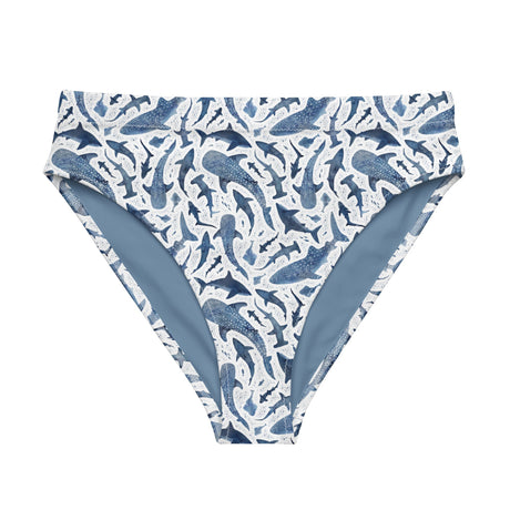 Ocean Motion Wear high-waisted bikini bottom in white with a blue shark print made from recycled fabric.