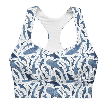 Ocean Motion Wear blue shark print longline sports bra with a racerback design and compression fabric.
